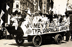 In photo above, a float ready to spread the workers’ message awaited a team of horses. But most of the participants in this “Labor Parade” in New York in 1909 were on foot (below).