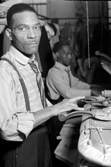 A textile worker photographed by Hine while on assignment for the Amalgamated Clothing Workers Union, 1920s (George Eastman House, International Museum of Photography and Film )