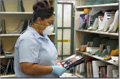 Many postal workers wore protective gloves and masks in the wake of the anthrax terrorism attacks.