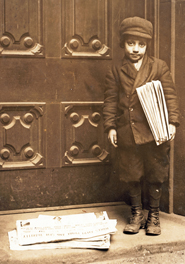 A young newsboy in New York City.
