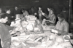 The 6888th, sorting mail with French soldiers in France.