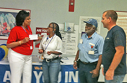 Greater Kansas City Metro Area Local Vice President Paulette Lindsey talks to APWU members about asking their co-workers to join the union. Greater Kansas City Metro Area Local Vice President Paulette Lindsey prepares union members to greet and sign up non-members.