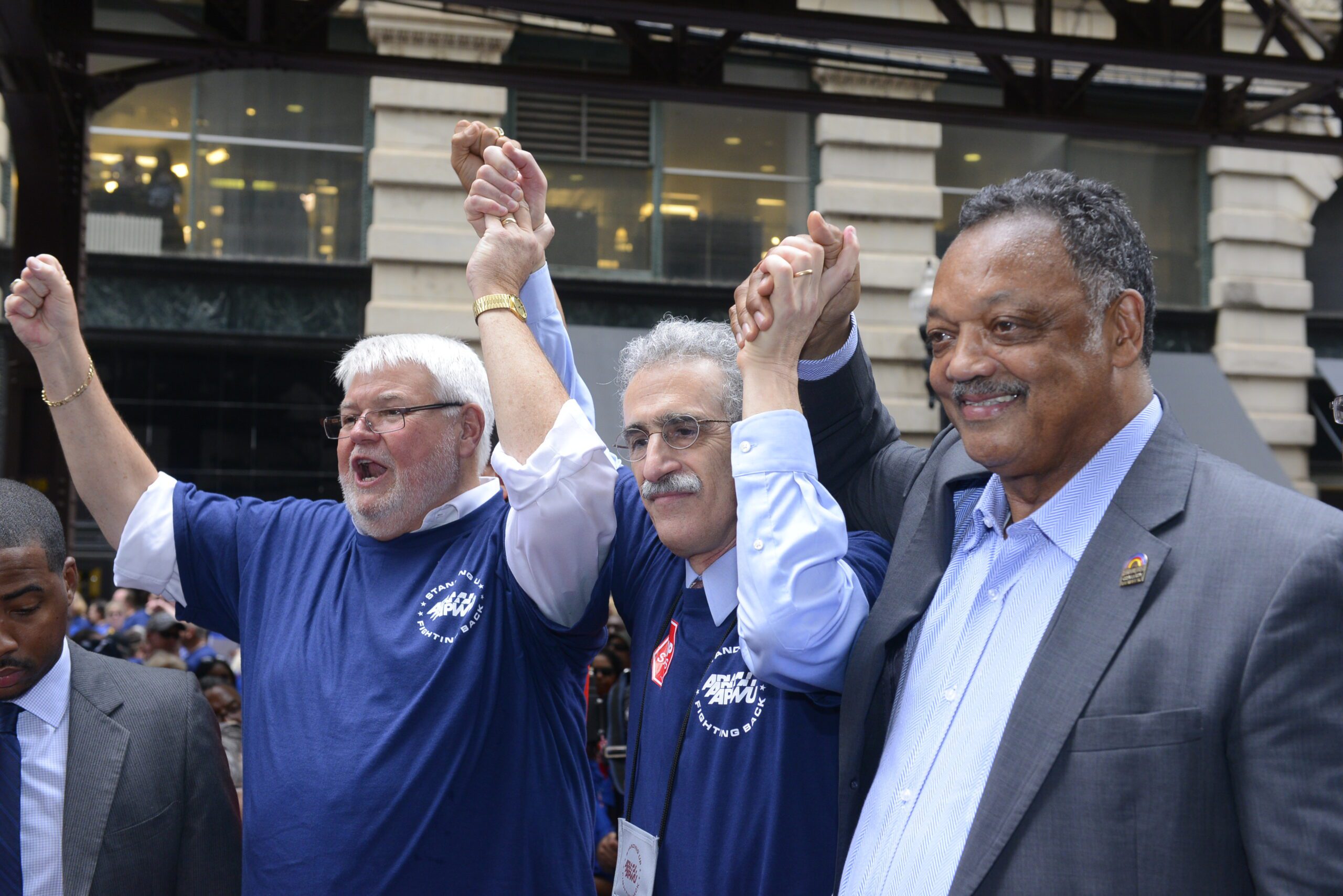 Rev. Jesse Jackson with APWU President Mark Dimondstein and AFGE President David Cox at the 2014 Stop Staples rally in Chicago